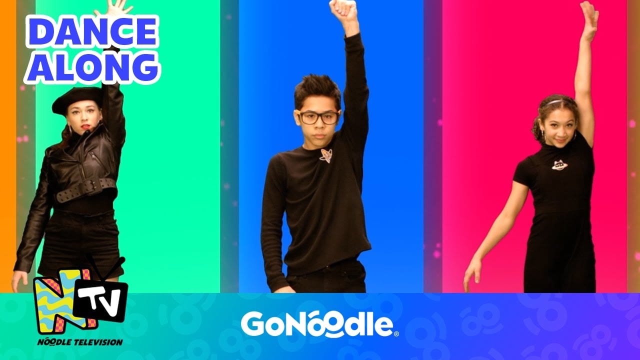 Three kids wearing all black hold their hands in the air for the Go Noodle Dance Along video