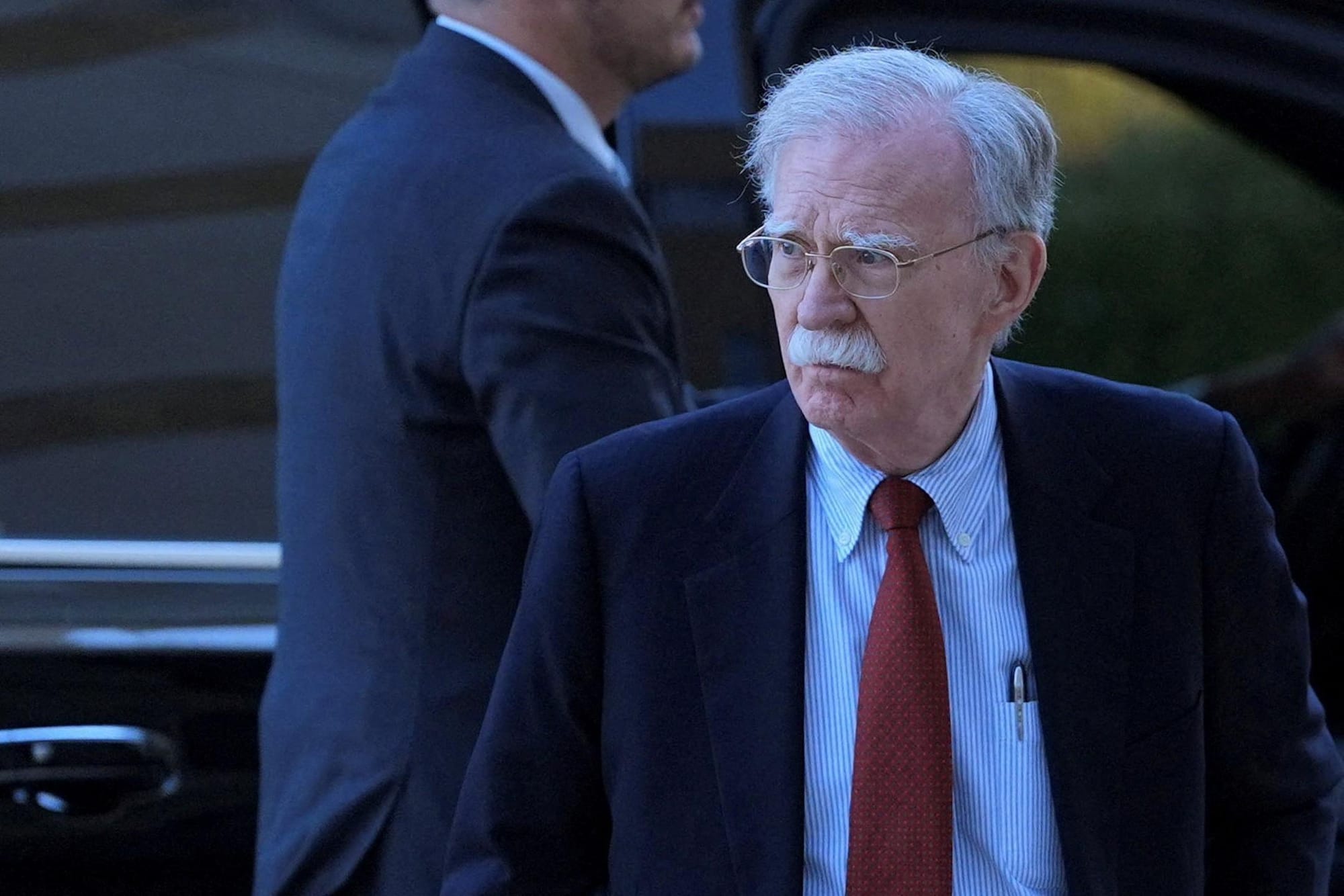 News Wrap: John Bolton to plead guilty to felony charge