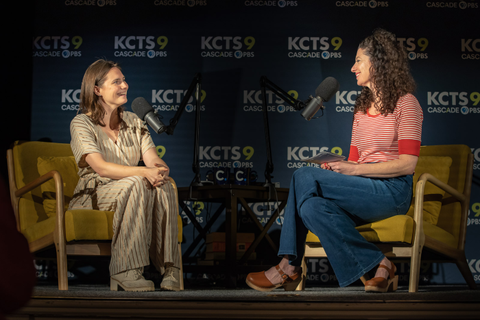 Rachel Belle and Amanda Knox talk on stage