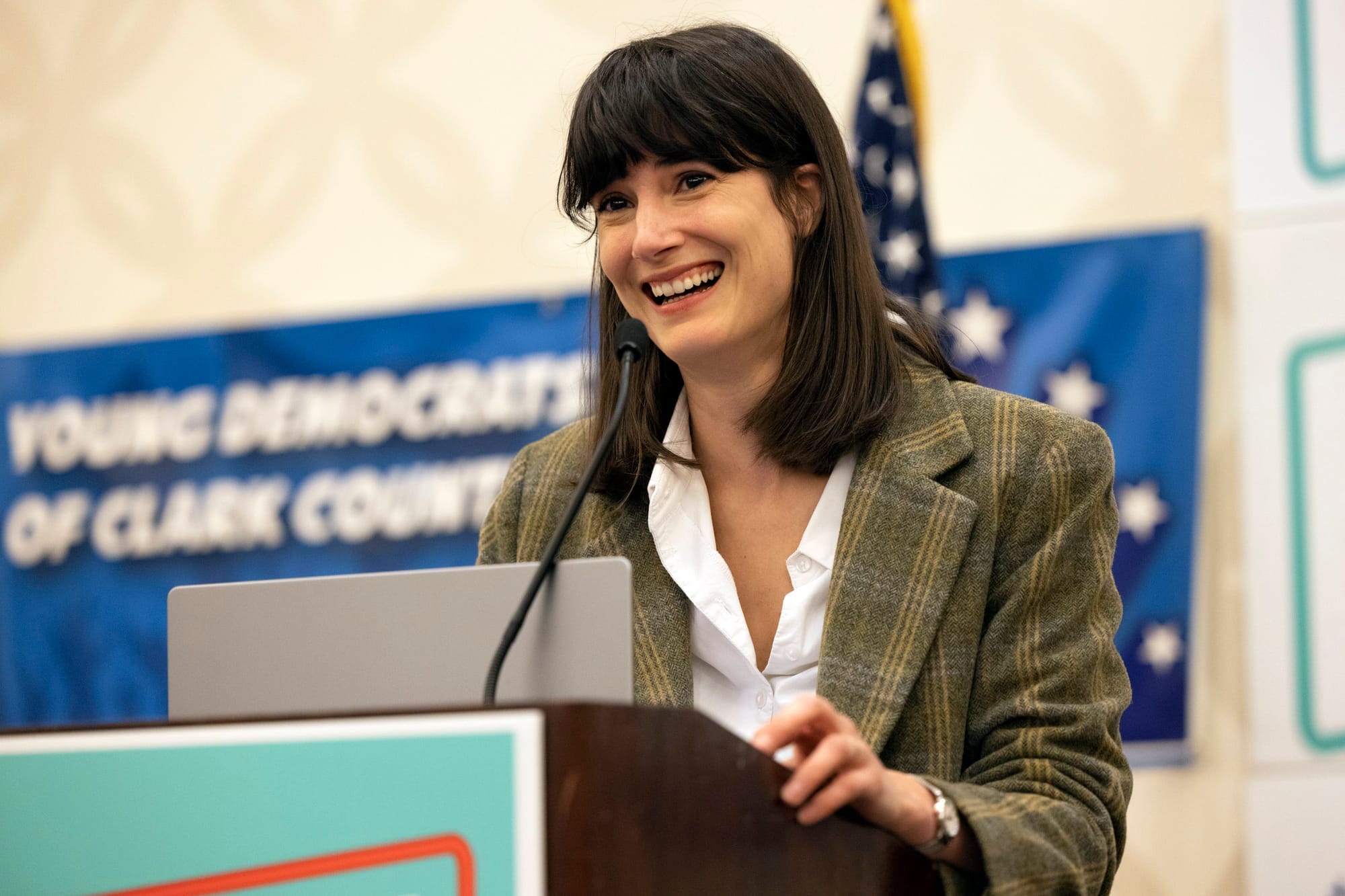 a close up of a smiling woman