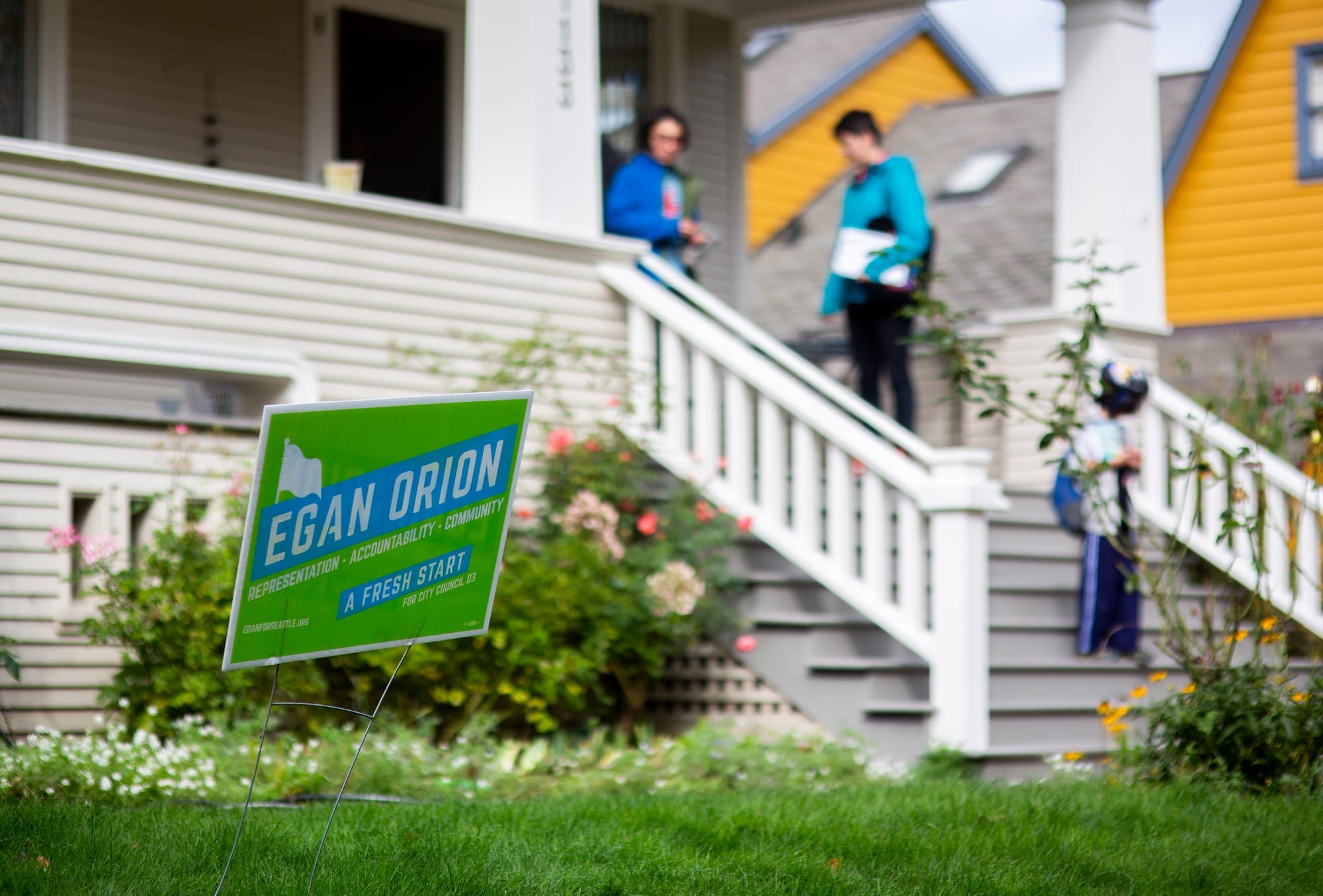 Campaign signs on a lawn.