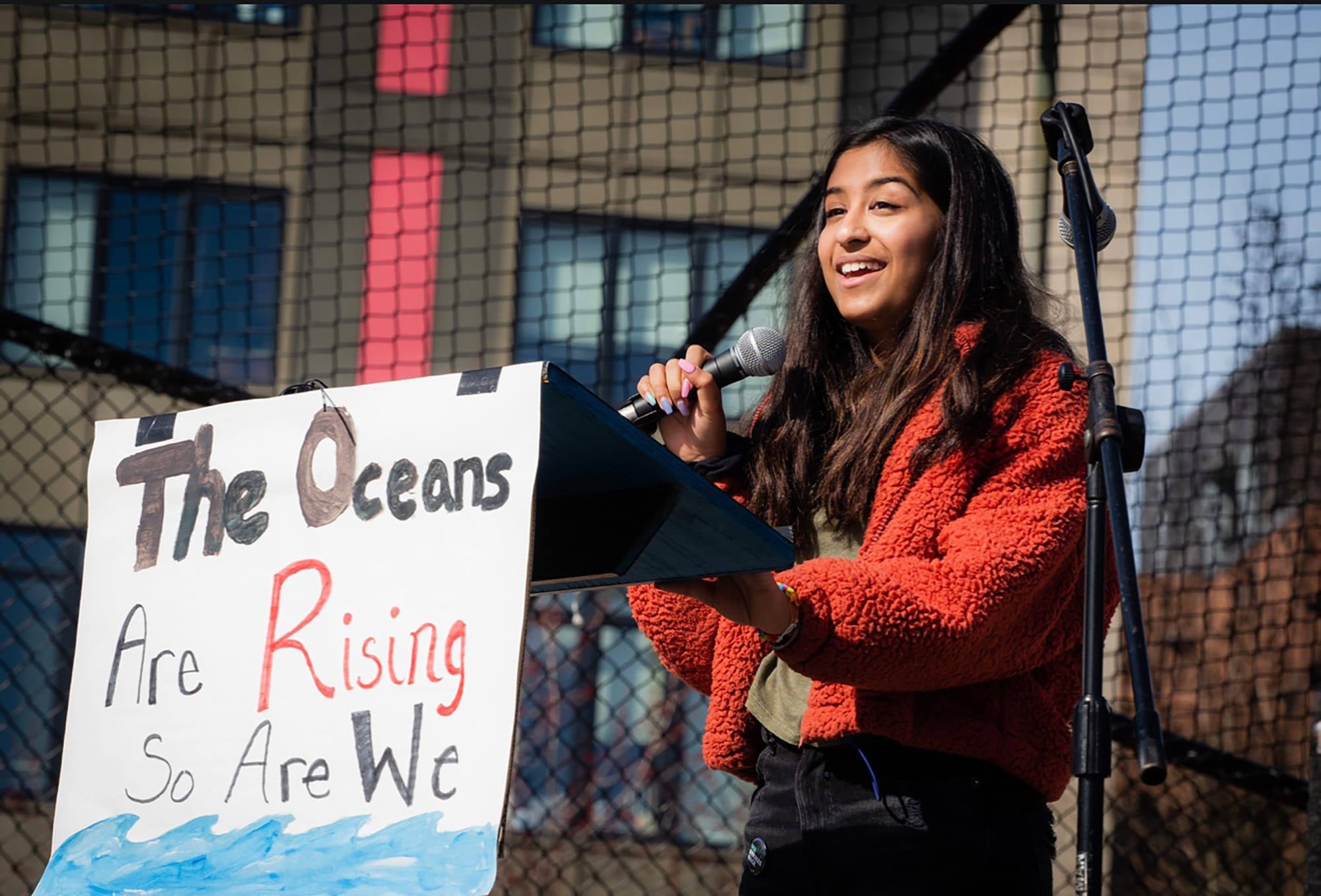 Kimaya speaks at a protest