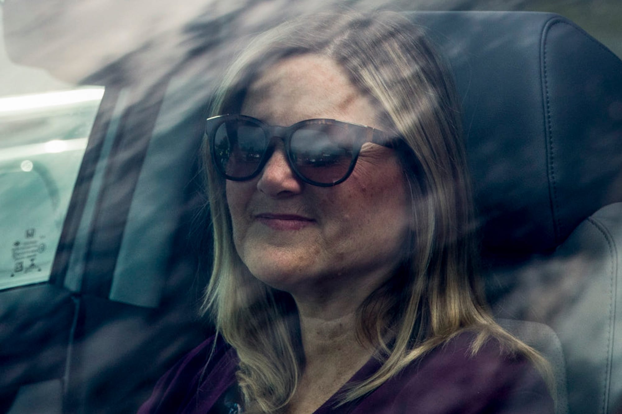 A woman in a car