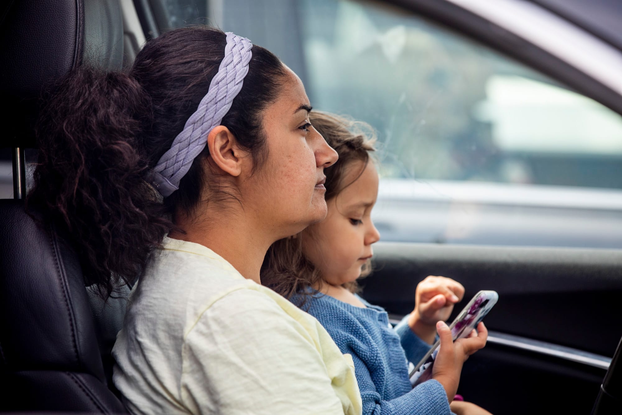 Mother and daughter in a car