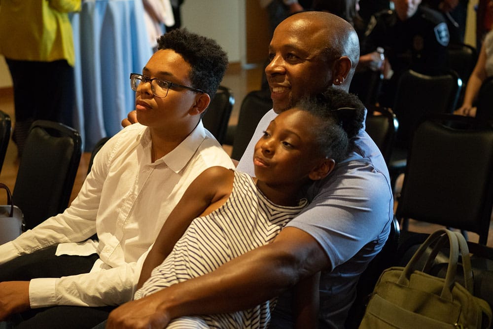 Family of Police Chief Best watch as she recieves her honors.