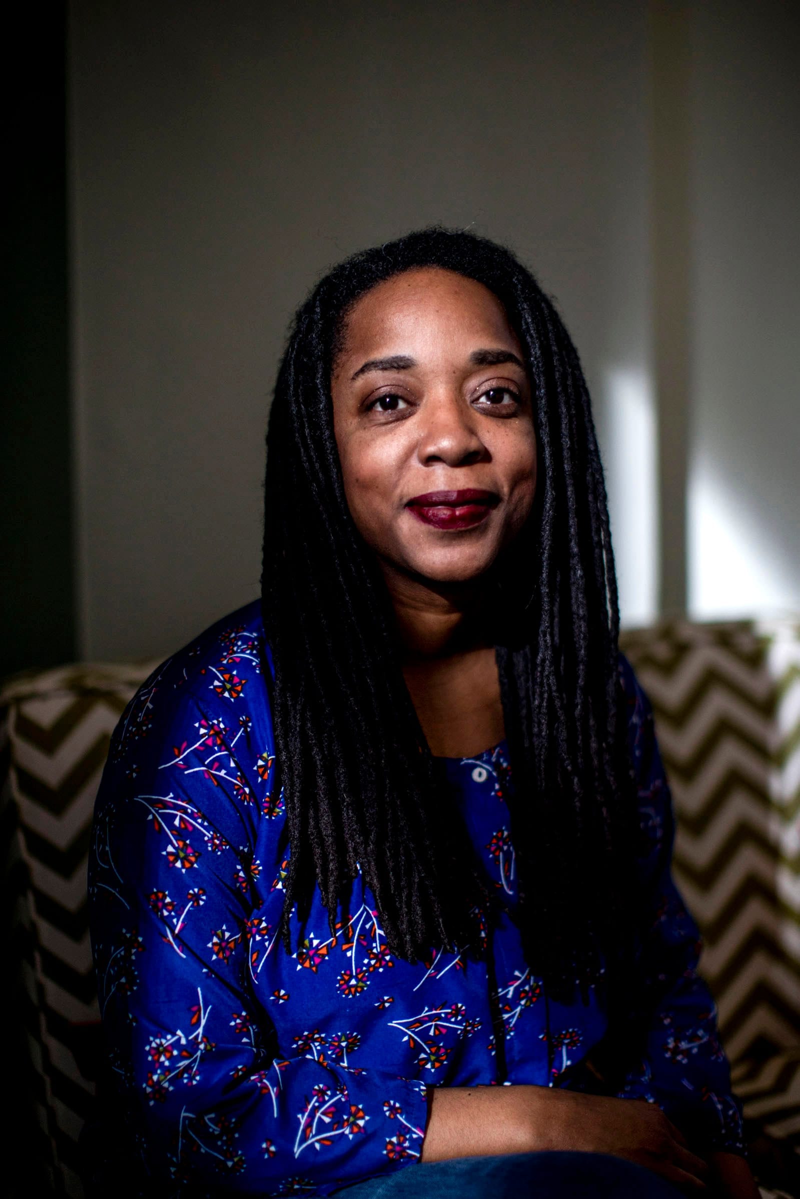Tarika Powell at Sightline Institute in Seattle on Monday, Feb. 25, 2019. Powell is a researcher focusing on fossil fuel infrastructure development and her work in the Pacific Northwest informs policymakers and activists. (Photo by Dorothy Edwards/Crosscut)