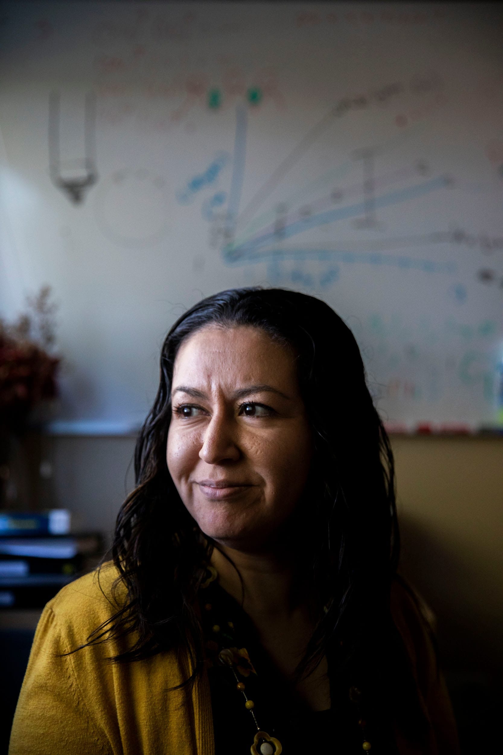 Associate Professor of Biology Tracie Delgado, Ph.D. in her office at Northwest University in Kirkland on March 4, 2019.