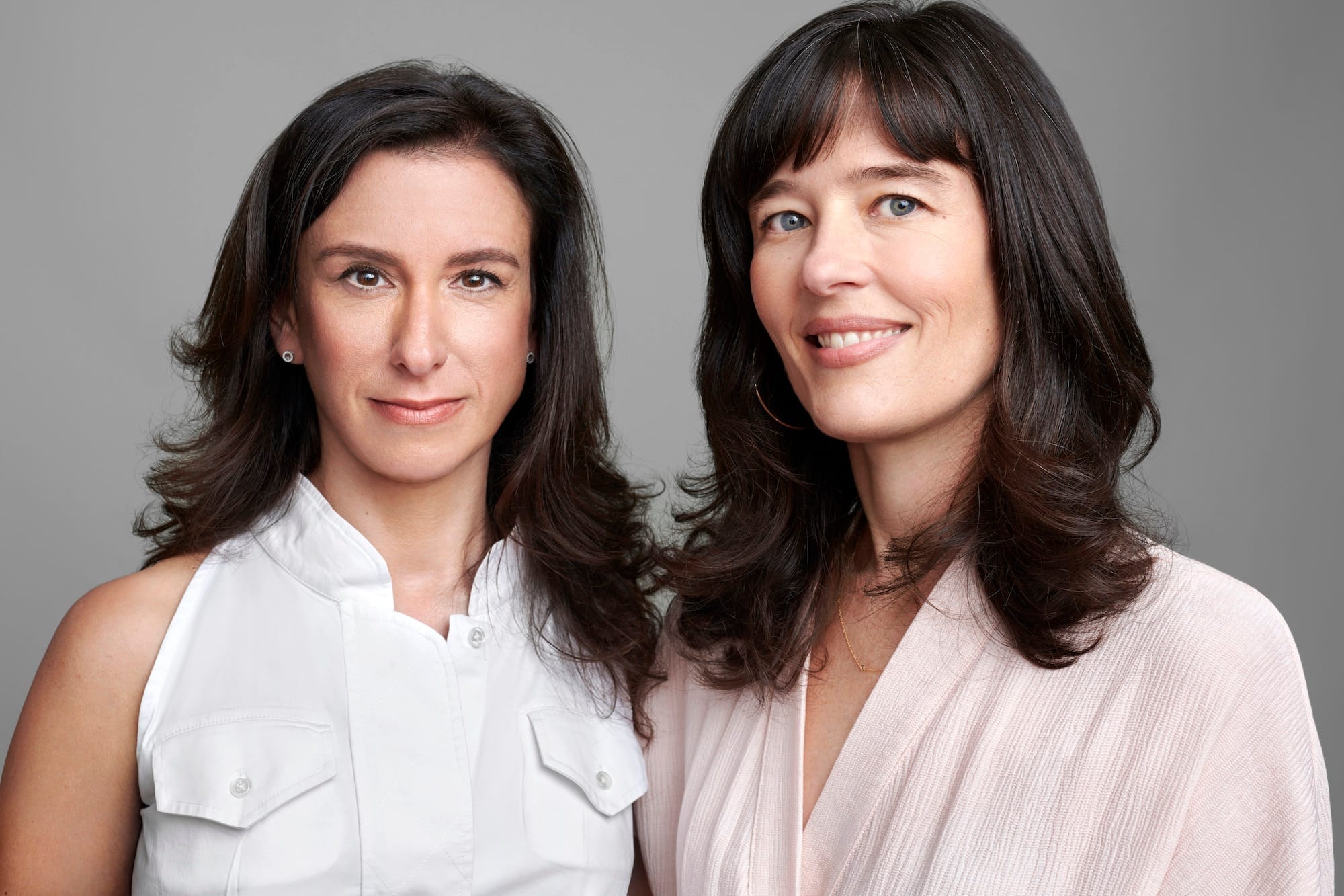 two women face forward