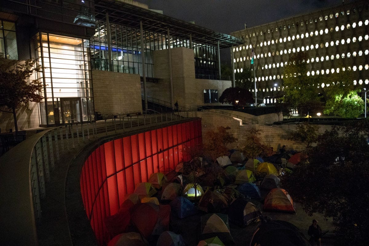 Harris-Talley and others sleep in tents along 4th Ave. in downtown Seattle outside of City Hall.