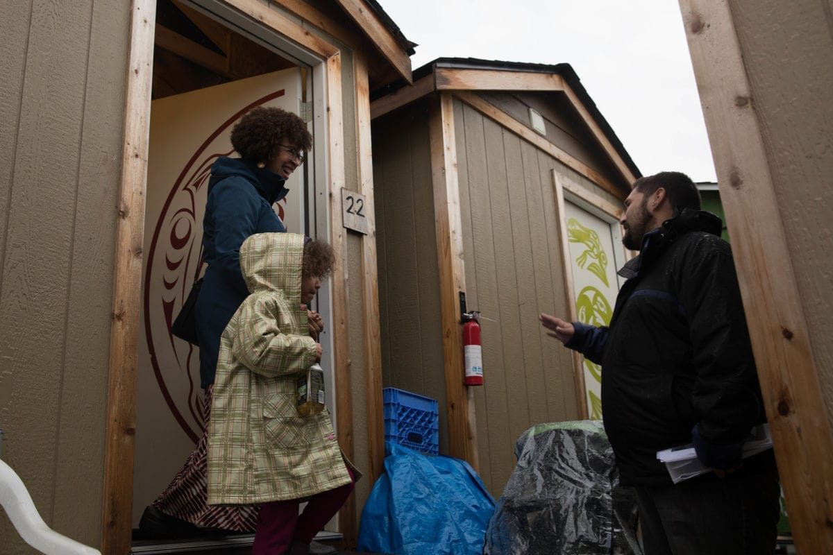 Harris-Talley and her daughter tour Nickelsville Othello, a city-sanctioned encampment in Rainier Valley.