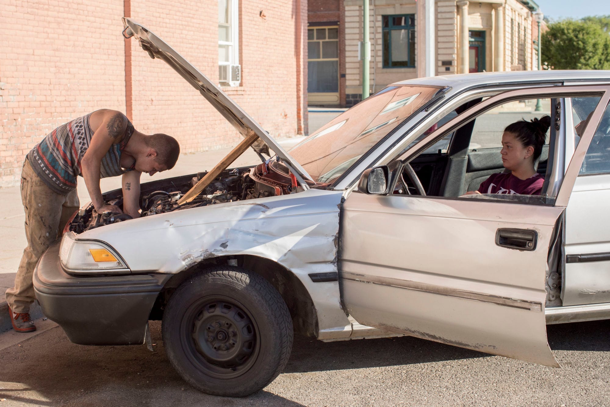 A man fixing his car