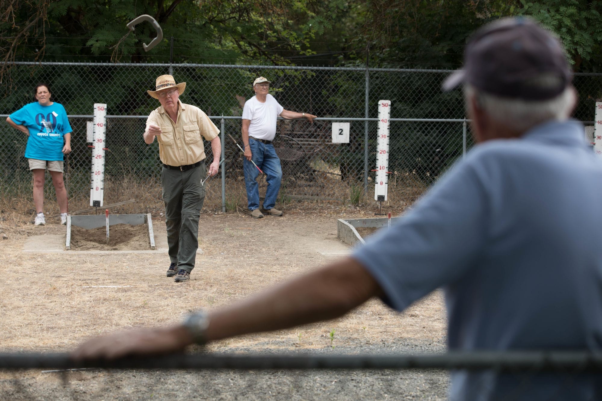 Attendees play horseshoe