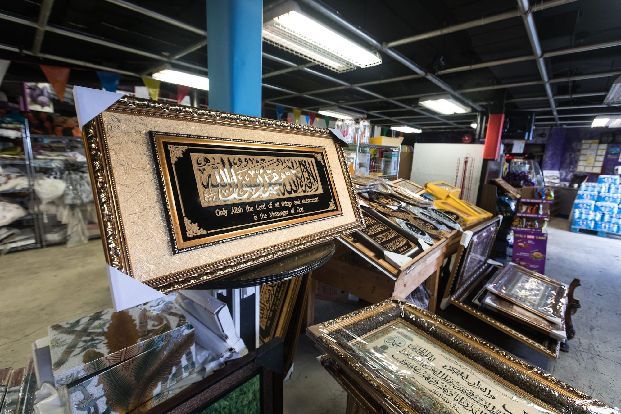 An Islamic prayer board lays at the entrance of the SeaTac Market.