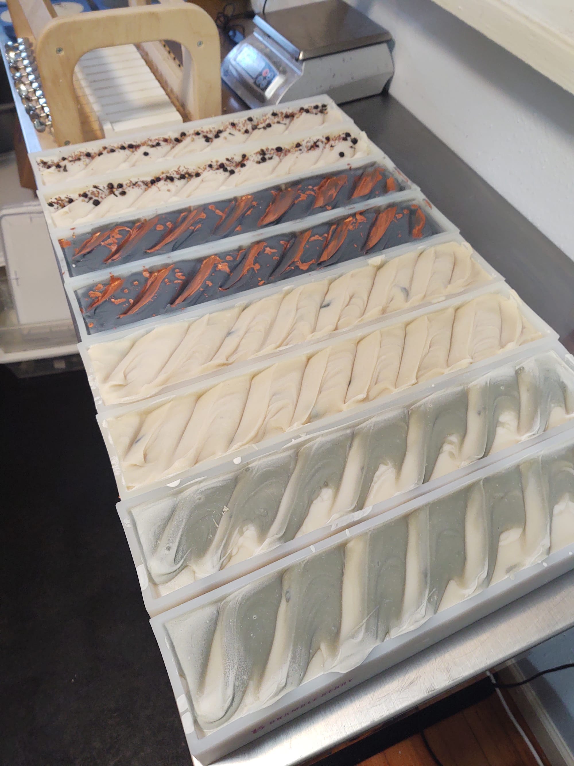 Pans of uncut soap