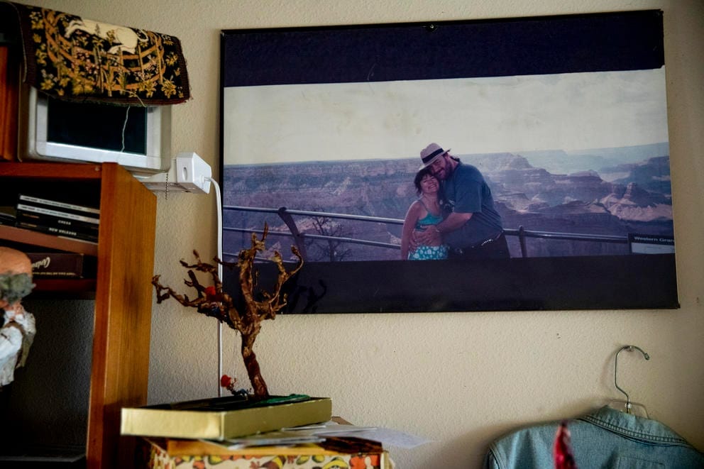 Eric and Mary in a photo on a wall