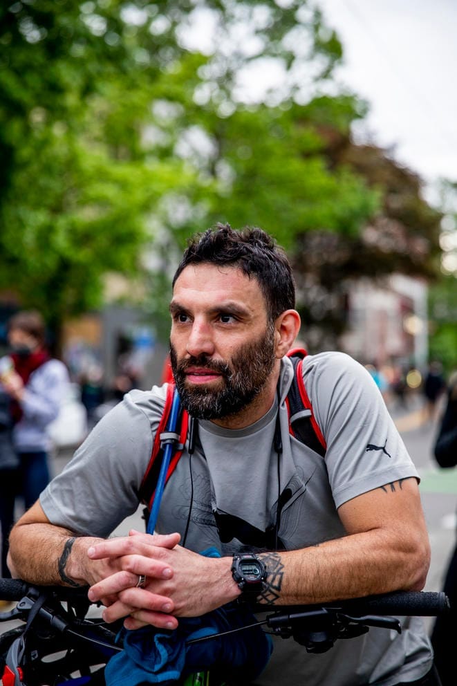 Portrait of a protester on a bike