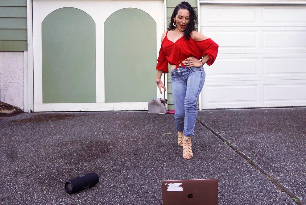 Vanessa Villalobos with a hand on her hip as she steps forward.