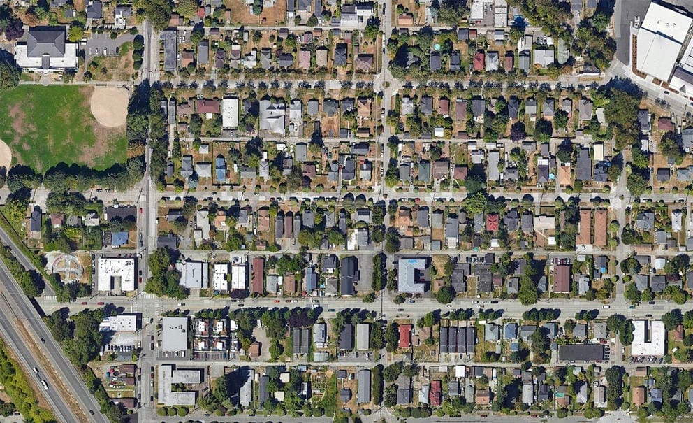 South Park from above revels a neighborhood with unkempt parks and many streets with few trees and vegetation.