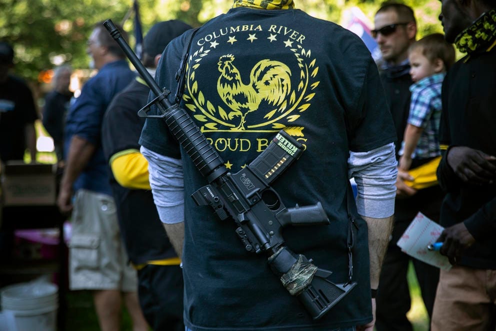 Man carrying gun
