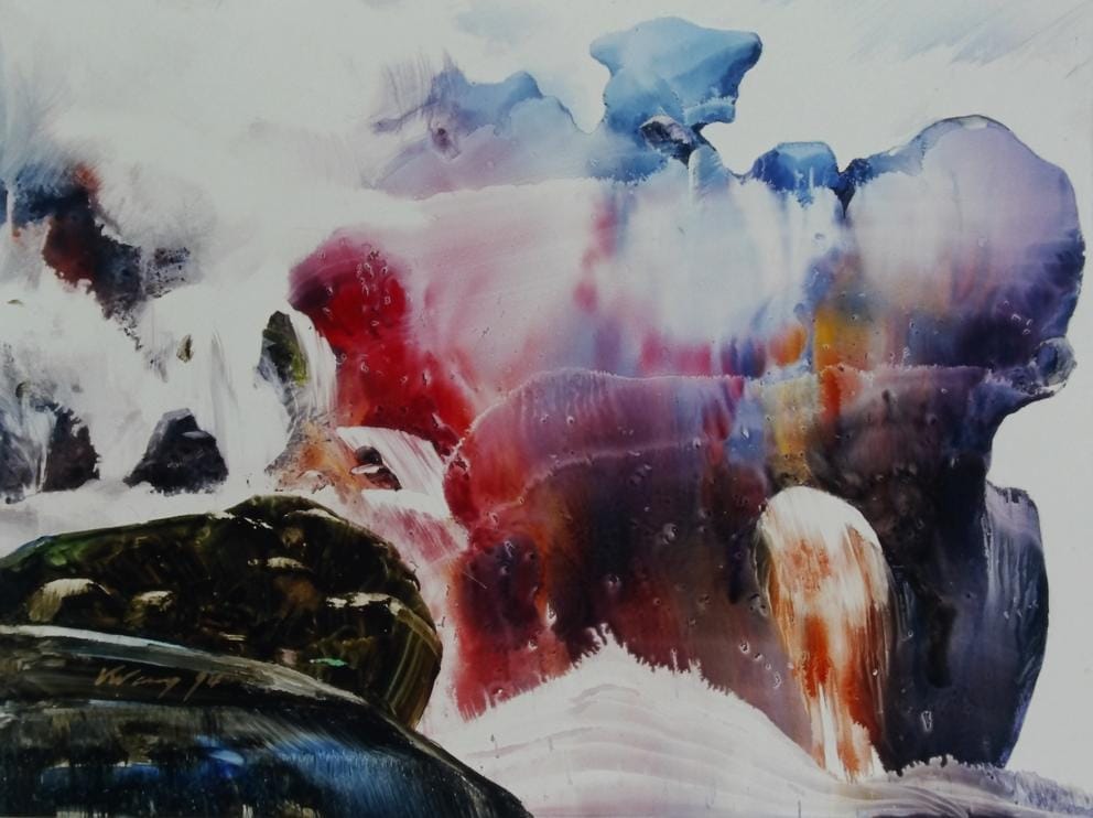 Painted colors run together in the shape of an abstract cloud 