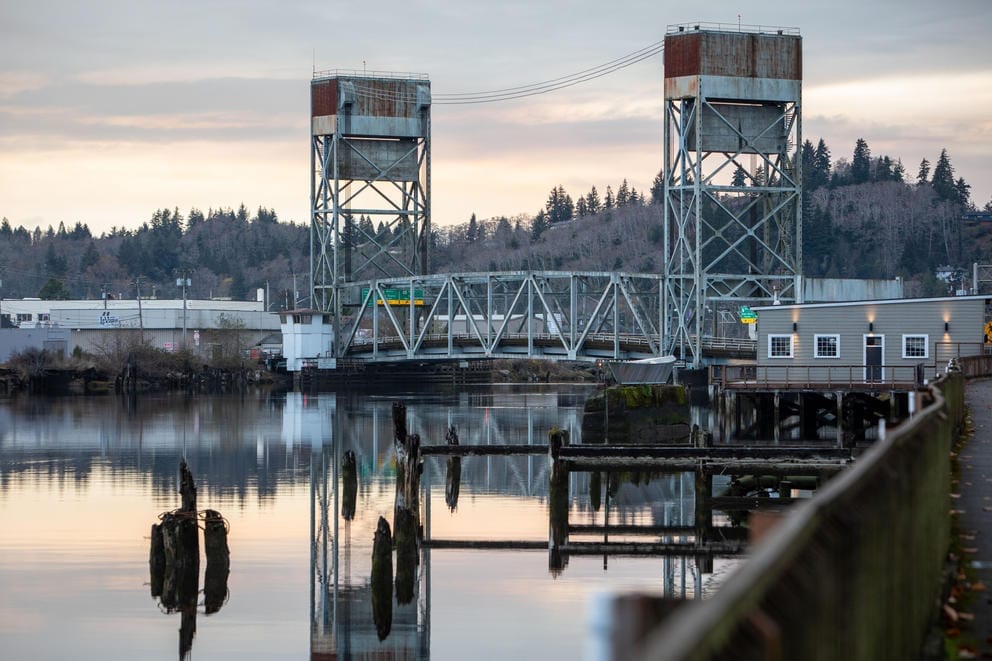 The Riverside Avenue Bridge reflects off the Hoquiam River.