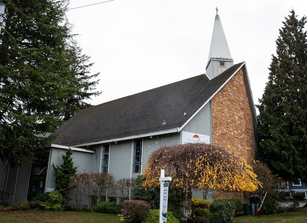 photo of a church with a white steeple