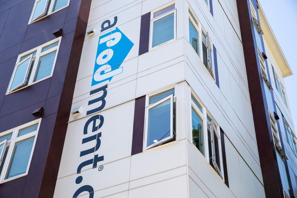 The façade of an aPodment building