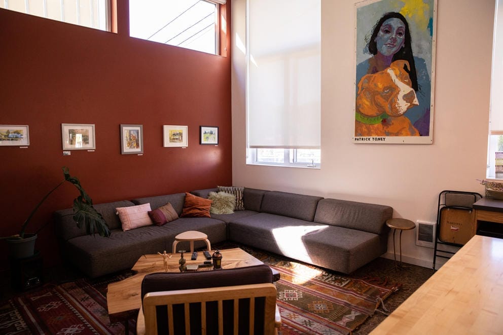 View of couches and tables in a lounge space