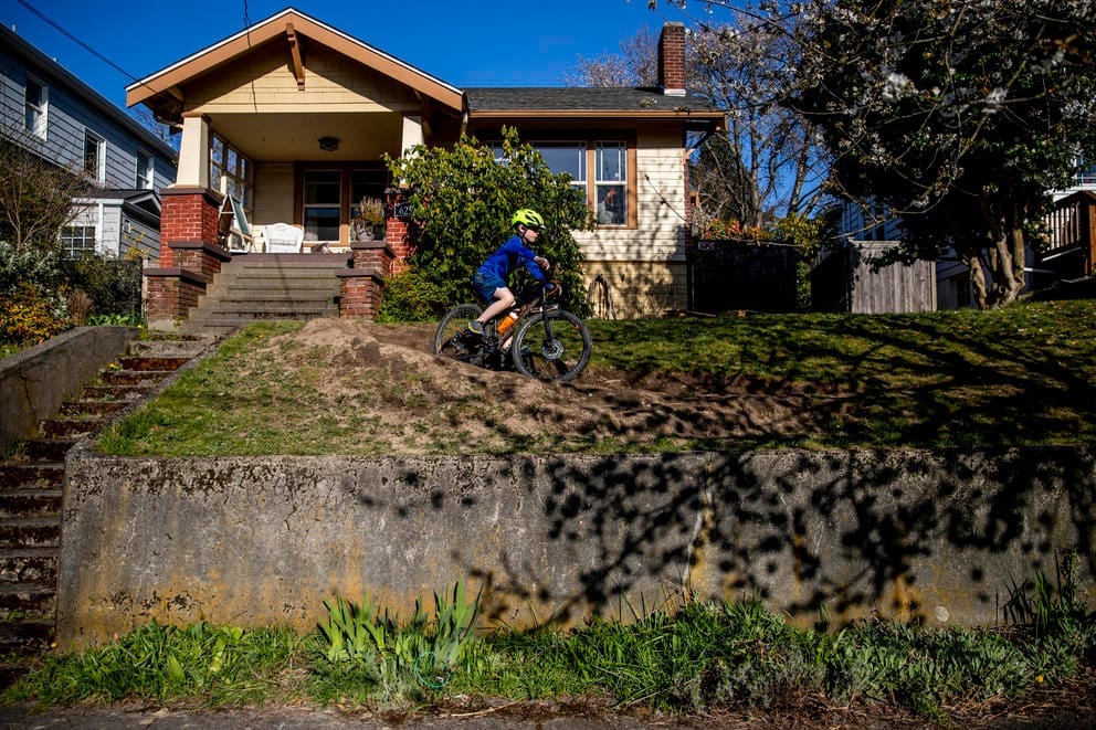 Hugo Flanagan, 8, rides his bike