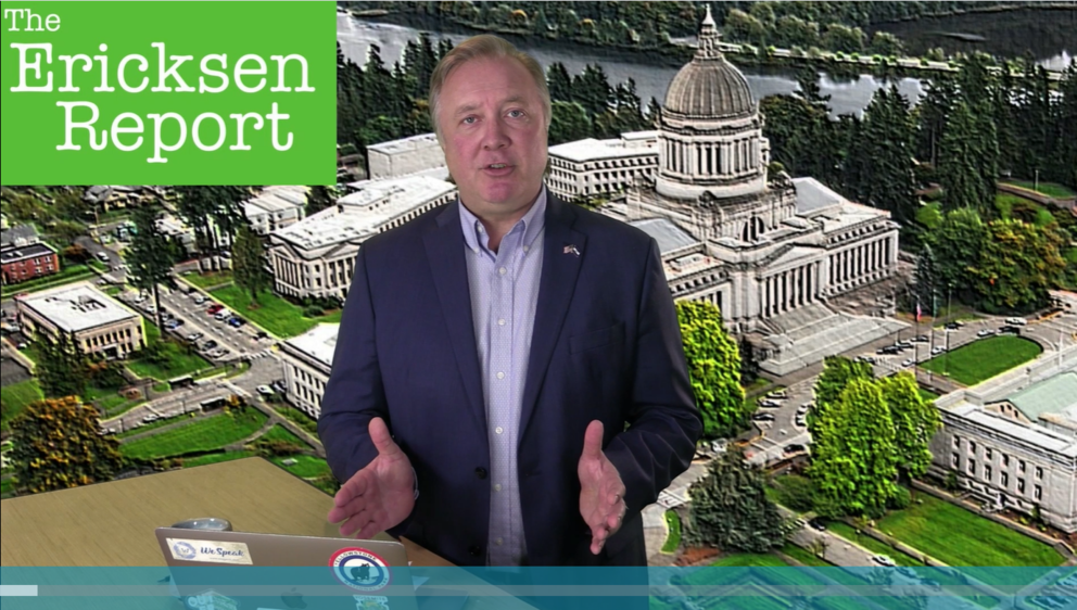 State Sen, Doug Ericksen stands in front of a background of the Legislative Building, with the words 