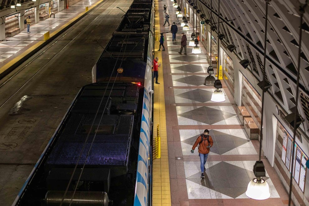 Riders enter and exit trains at the Pioneer Square Station in downtown Seattle