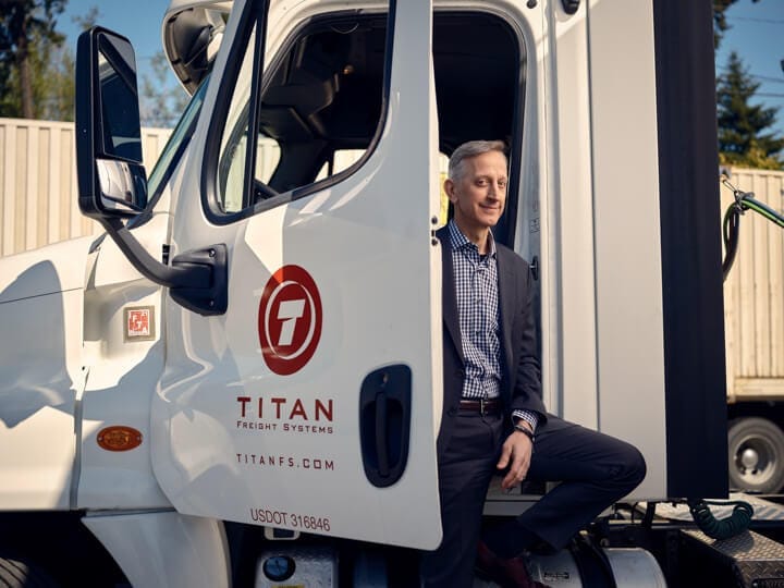 Man standing by a truck