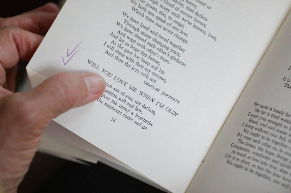 a close up of a page of a poetry book. The poem in focus is titled