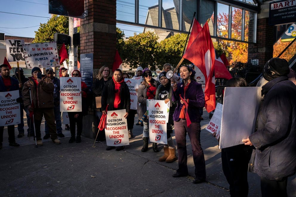 Demonstrators outside Metropolitan Market