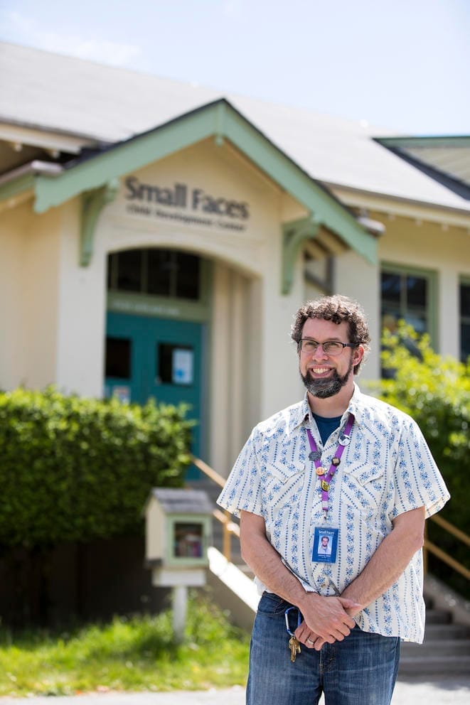 Man stands in front of building