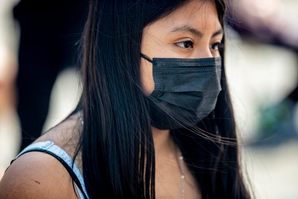 young woman with a mask