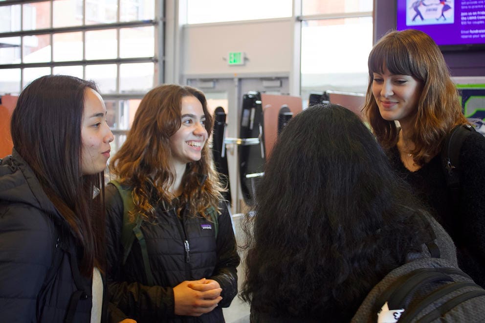 students chatting on the Lake Washington High School campus
