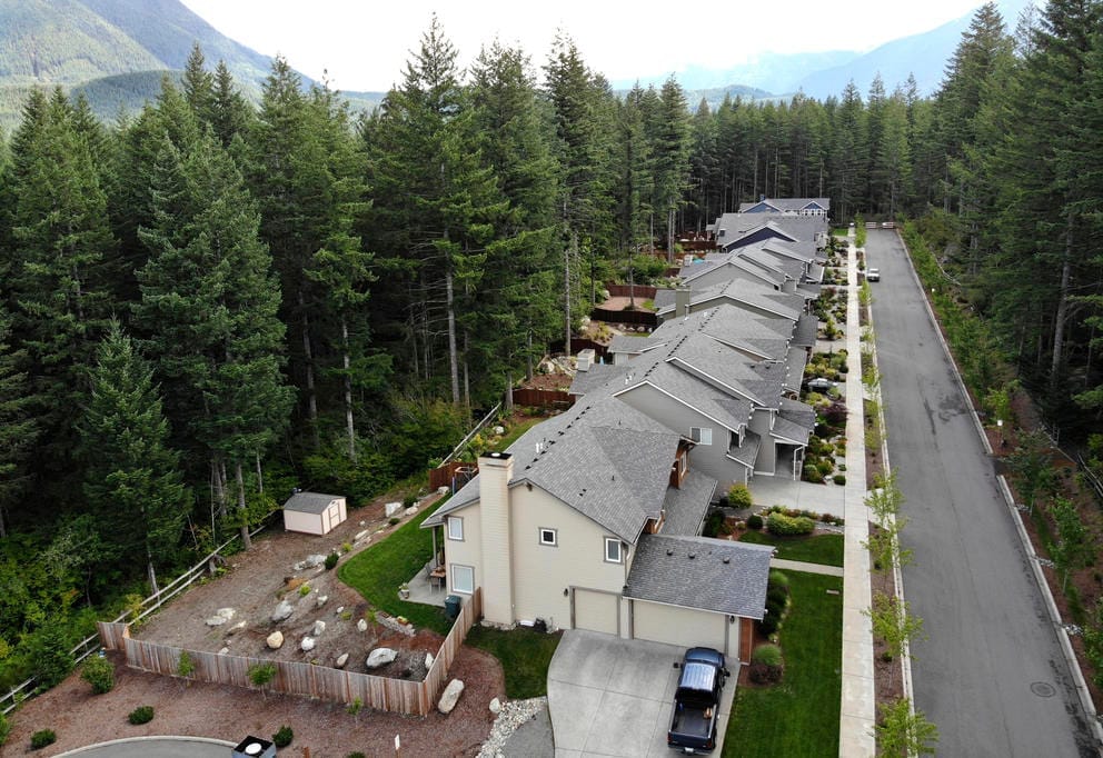 Houses surrounded by forest in the Cascade foothills of North Bend, Washington