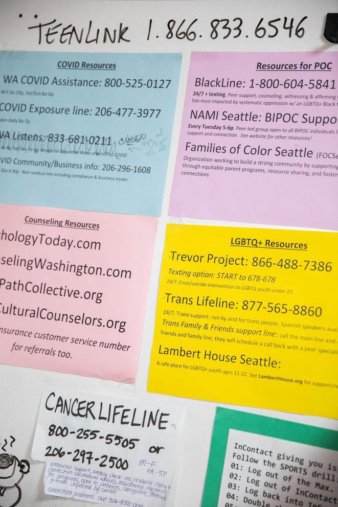 A board with a list of crisis numbers in Crisis Connections