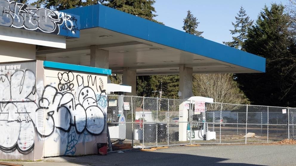 Graffiti covers an abandoned gas station in Seattle.