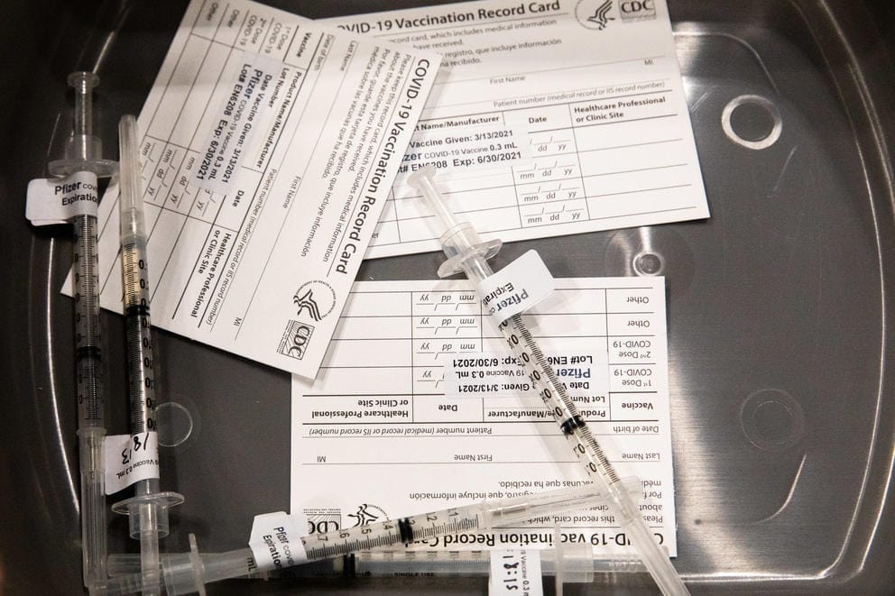 Syringes at Lumen Field Event Center's COVID-19 vaccination site