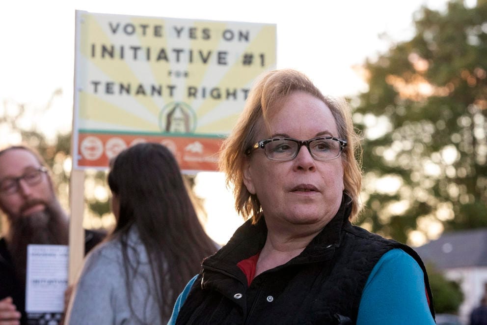 Tacoma substitute teacher Cathy Pick at a rally in support of Initiative 1