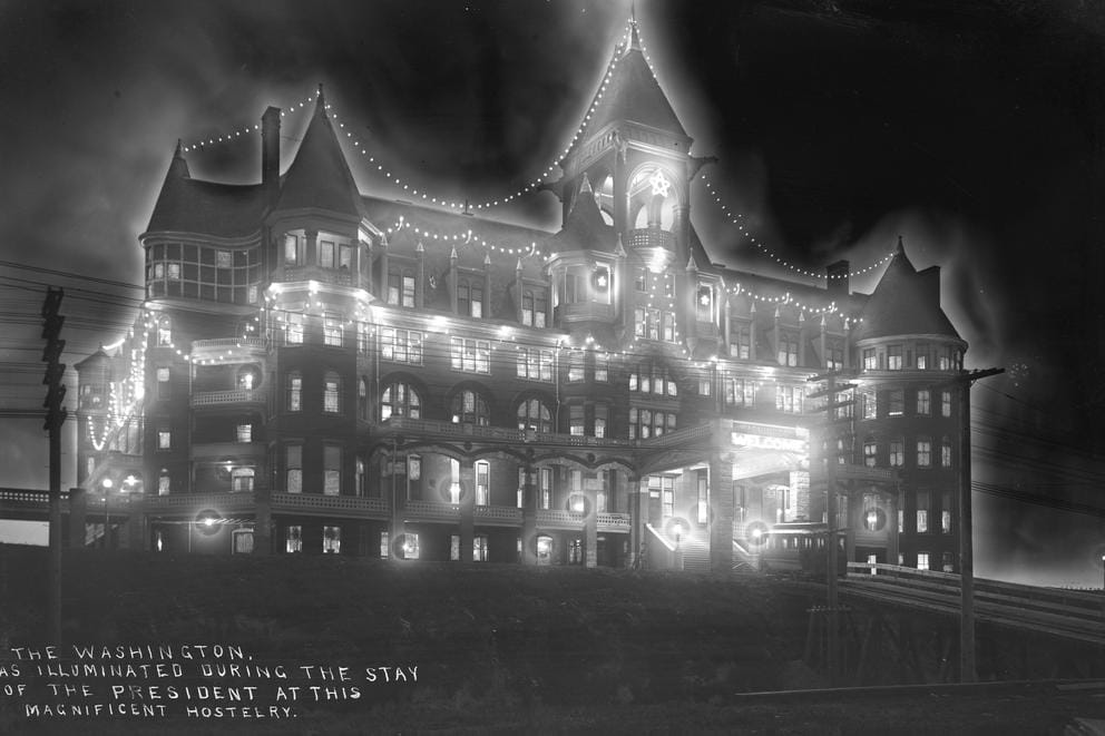 Curtis photograph of the old Washington hotel at night.