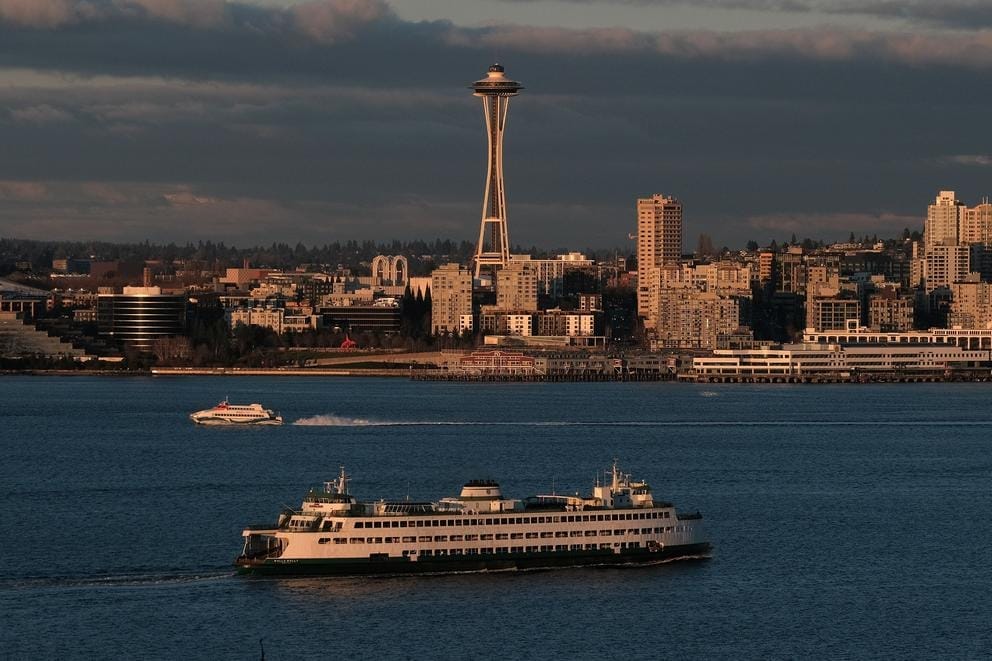 Seattle seen from the water, with a ferry in the foreground