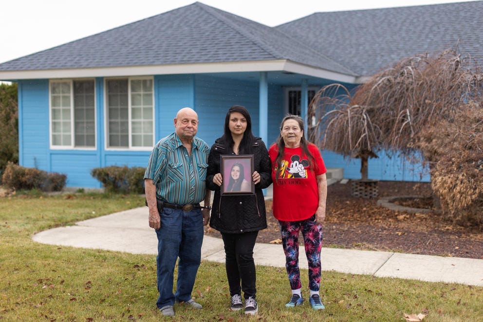 , Charlie, Charlotte, and Bonnie Groo stand outside the Yakima, Wash. home where Charlotte and Kit Mora were raised.