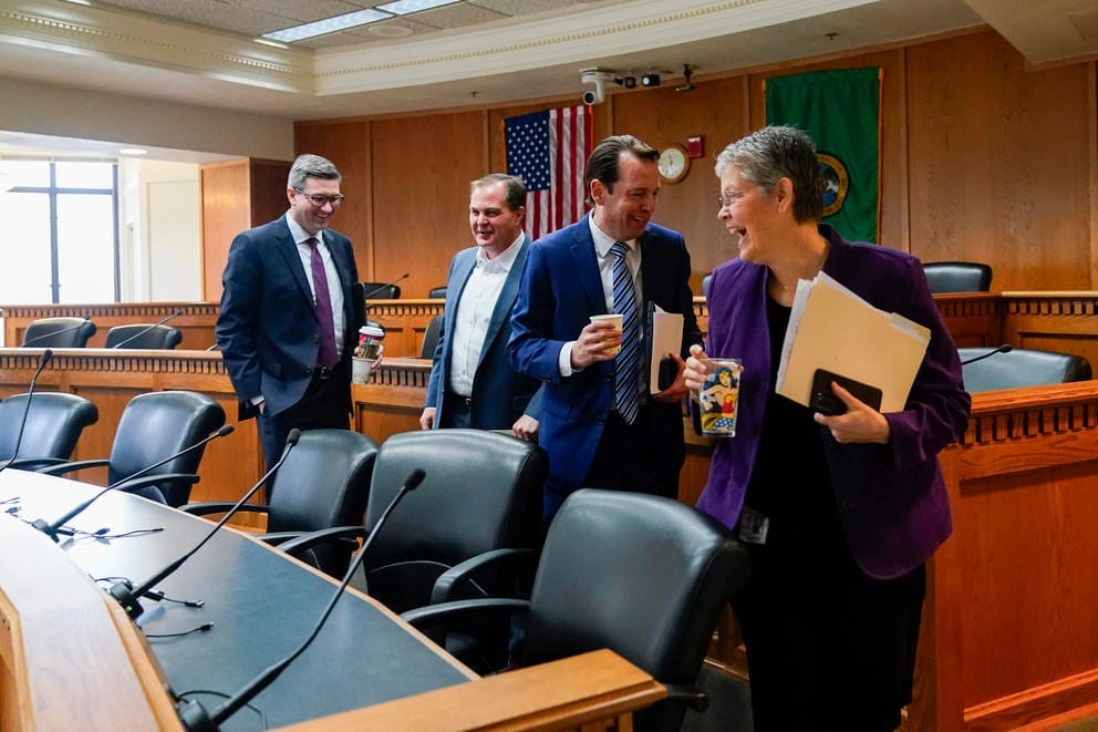 legislative leaders in a meeting room