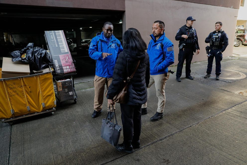 SPD officers stand with CARE team members