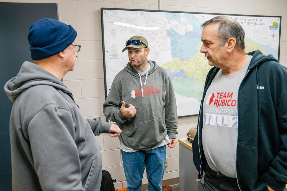 Lyle Knigge speaks with Team Rubicon members