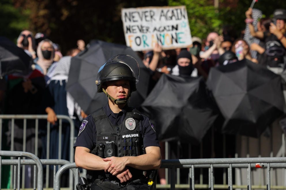 University police guard a blockade