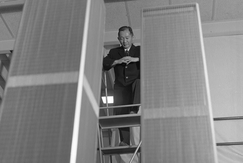 Yamasaki looks at a model of the World Trade Center